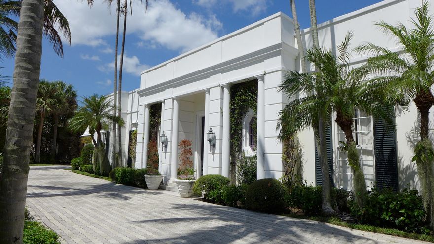 Stunning Palm Beach Regency built by Robert Gottfried and designed by Ames Bennett. Located in a wonderful central location, only three houses from the beach. The property is situated on a large lot approximately 140' X 125'.  The spacious residence offers 5 bedrooms, 5 1/2 baths, 10 foot ceilings on the first floor with a formal living room and dining room, a library/family room, kitchen and a cabana/exercise room right off the large swimming pool. Other features include lush tropical landscaping with two papaya trees, private street with underground utilities, deeded beach access for homeowners and their guests, and easy access to the Palm Beach bike trail.