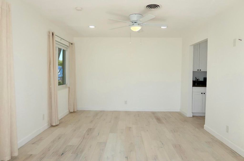 Photo of 1314 Barrington Drive, West Palm Beach, FL 33406 (MLS # B26023525)