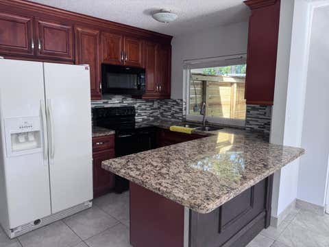 Photo of 3004 NW 4TH Terrace #4-141, Pompano Beach, FL 33064 (MLS # B26064059)