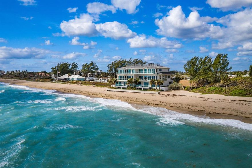 With nearly a $2M price improvement, 5003 Old Ocean is the perfect seasonal retreat.  Enchanting enough to stay forever, this spectacular and architecturally significant Oceanfront Townhouse is truly a one-of-a-kind jewel that redefines the beachfront experience. Located in highly coveted Ocean Ridge and exquisitely framed to capture unrivaled ocean views and breathtaking sunrises the townhouse is ideally suited for luxurious modern lifestyles.  Featuring 7,337 total square feet  4 bedrooms with ocean views, 4 plus bathrooms, the homes-bespoke finishes include Italian porcelain flooring throughout, commercial grade glass elevator, ultra custom kitchen cabinets with polished chrome surround, two islands, a Subzero refrigeration system  2 Fisher Paykel  dishwashers, Wolf ovens and custom quartz countertops. A large butler/food prep pantry area combine to make the cooking experience a chef's delight.  The chic and light filled grand room with Souring floor to ceiling   glass doors and windows seamlessly blend outdoor and indoor living. The sumptuous master suite with private oceanfront deck and European style bathroom with a separate soaking tub, shower, custom sinks and toilet. The spacious guest suites also enjoy their own private oceanfront deck. Additional features include state of the art security and sound system, 2 plus garage, new seawall custom interior doors with polished chrome handles. The home is built to the most exacting codes using the finest craftsmanship and materials and offers the discerning buyer carefree living. Moments to shopping and all the delights, the beach area offers.