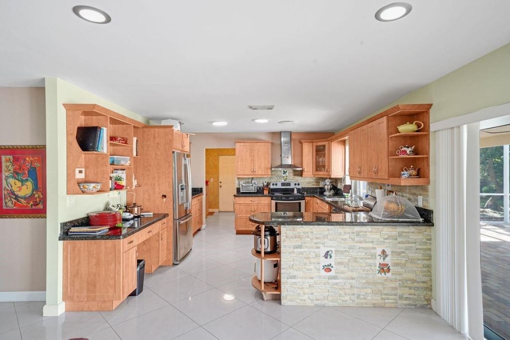 Photo of 6207 Royal Poinciana Lane, Tamarac, FL 33319 (MLS # F10537018)