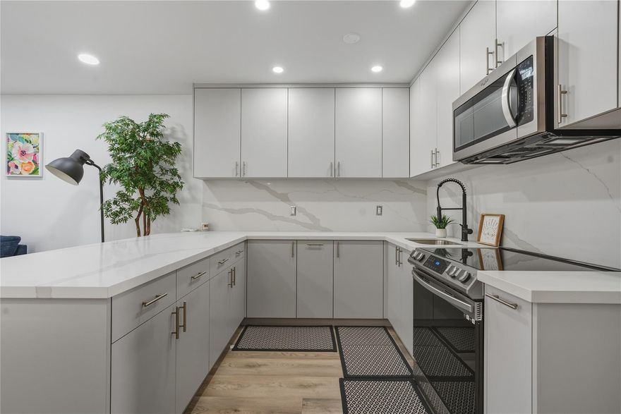 Welcome to this beautifully remodeled ground-floor waterfront co-op in Hallandale Beach, located in a desirable 55+ community. This move-in ready unit has been completely renovated and features modern European-style cabinetry, updated finishes, and a bright open layout. Enjoy a custom closet system for added storage and organization. Step outside your door and take in peaceful water views, perfect for relaxing mornings and sunset evenings. Conveniently located just minutes from the beach, shopping, dining, and entertainment. A rare opportunity to own a stylish waterfront home offering comfort, location, and exceptional value in Hallandale Beach. Leasing is permitted after one (1) year of ownership.