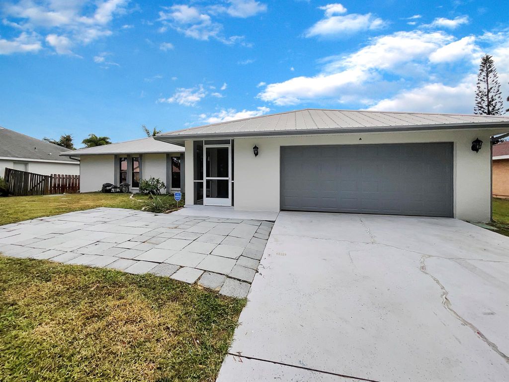 Photo of 356 SE Husted Terrace, Port Saint Lucie, FL 34983 (MLS # R10935439)
