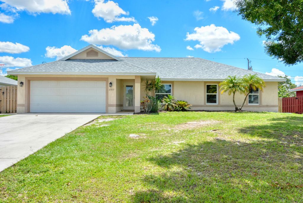 Photo of 2817 SW Savona Boulevard, Port Saint Lucie, FL 34953 (MLS # R11000053)
