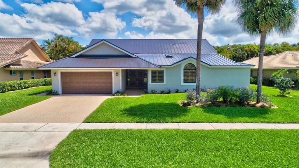 Photo of 4556 White Cedar Lane, Delray Beach, FL 33445 (MLS # R10726399)