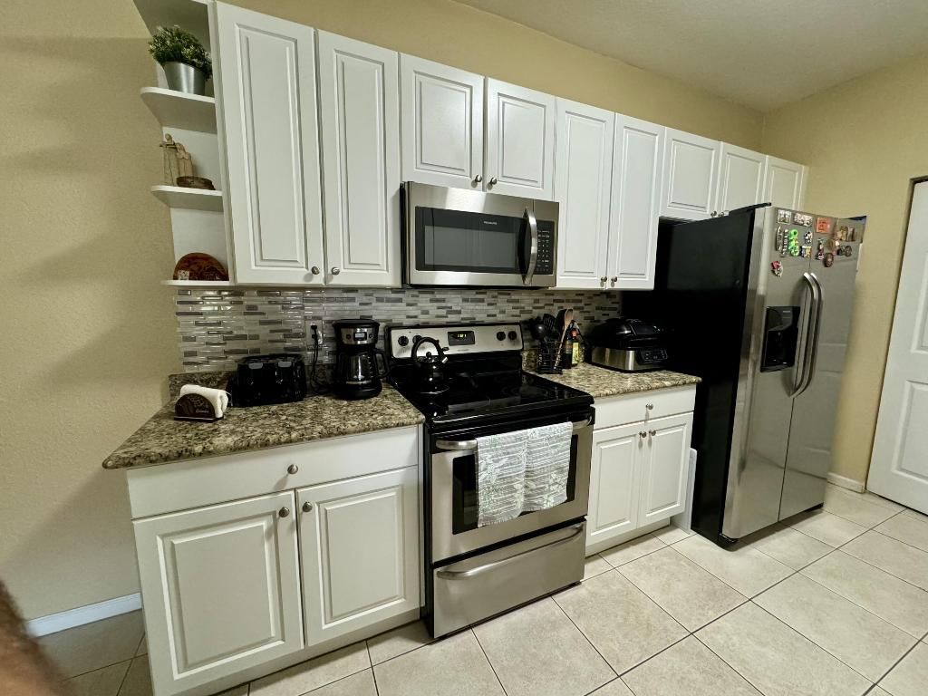 Photo of 3565 Forest Hill Boulevard #82, Palm Springs, FL 33406 (MLS # R10997197)