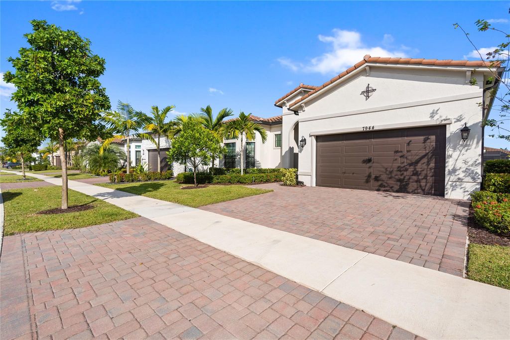 Photo of 7944 Ironwood Way, Parkland, FL 33067 (MLS # F10537990)