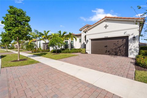 Photo of 7944 Ironwood Way, Parkland, FL 33067 (MLS # F10537990)