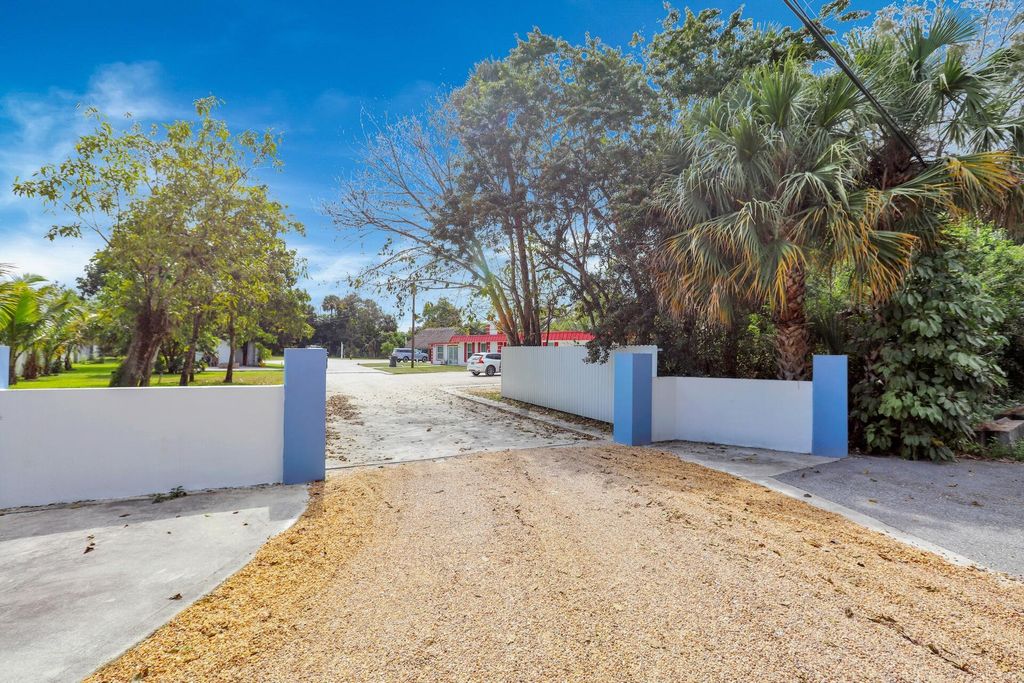 Photo of 140 Possum Pass Pass, West Palm Beach, FL 33413 (MLS # R11166914)