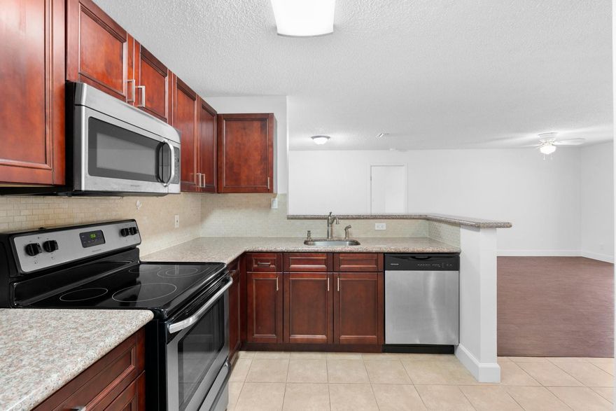 Investors! Great location close to all Coral Springs has to offer, highways, restaurants, and place of worship. This 2 bed 2 bath condo is located in the gated community of Atlantic Springs. The unit features 2 bedrooms with en suites, large living spaces, and a peaceful patio to unwind at the end of the day. The kitchen features granite counter tops and newer appliances. Washer and Dryer in the unit along with a storage closet on the balcony. Well cared for community with tennis courts and 2 pools. Property is currently leased until November 15th, 2026.