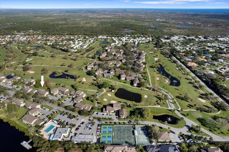 GOLF, TENNIS & PICKLEBALL INCLUDED! Fabulous one-level condo has gorgeous golf and pond views from two porches directly on the beautiful course at Rverbend! Owners enjoy terrific amenities including 3 Har Tru tennis courts, 4 Pickleball courts, spa-like pool plus golf privileges on a Fazio 18h course. Your 2/2, premium, first floor condo features an updated kitchen with white Shaker cabinets & tile backsplash. Main space and balcony is under renovation and new owner will be able to CHOOSE YOUR OWN FLOORING AT NO ADDITIONAL COST! This is an incredible value in the Jupiter/Tequesta area. Gated and beautifully manicured area. Heated pools by the river. Charming clubhouse and winding streets for walking/jogging/biking. IMPACT Sliders. 2024 Roof. Don't miss this special opportunity!