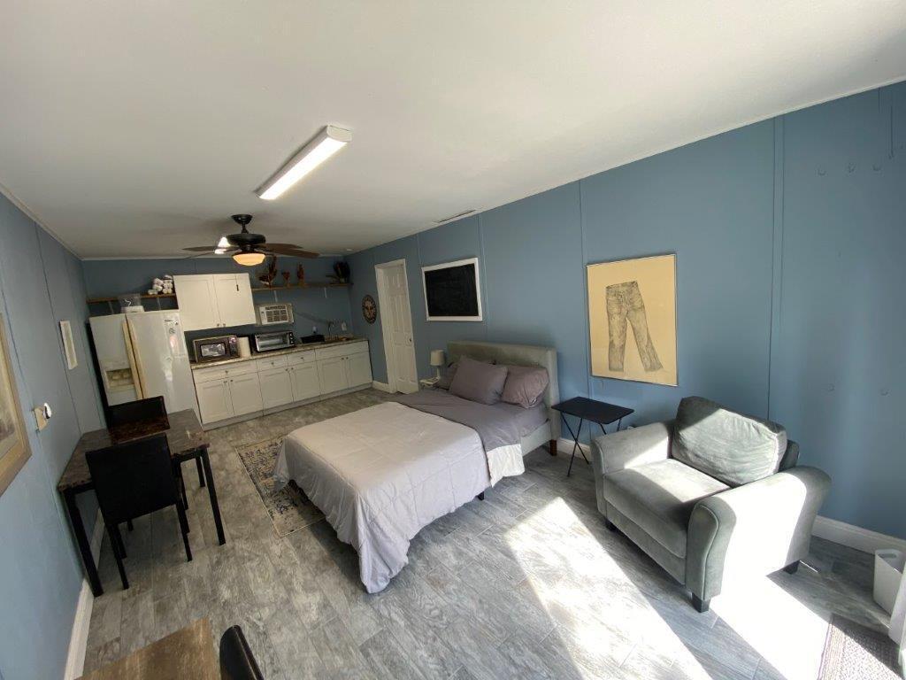 Equestrian delight! Seasonal/Annual studio apt. Currently occupied: Available 2/10/2026.  Live w/your horse on 14 Ac farm on B Rd in Lox. Groves minutes from PBIEC/WEF!  (Options for partial board or dry stalls). Features: Newly  constructed cover over 20mx40m GGT footing warm-up arena + separate XLg all-purpose arena w/non-flooding bouncy screening sand/clay w/flat grass footing + trails & shaded paddocks. Studio has full bath, queen thermopedic bed, desk, kitchenette w/refrigerator, convection & toaster oven. +$50/mo for electric,. Water/shared use of laundry included. Hotspot recommended for Wifi. Private gate to enter farm, park by entrance. No smoking on premises. An animal sanctuary-no guests allowed. Small pet considered on case-by-case basis. No cats due to allergies.