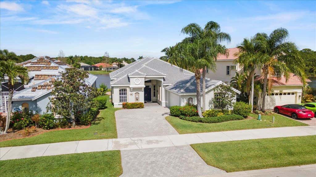 Photo of 614 SW Lake Charles Circle, Port Saint Lucie, FL 34986 (MLS # R11078662)