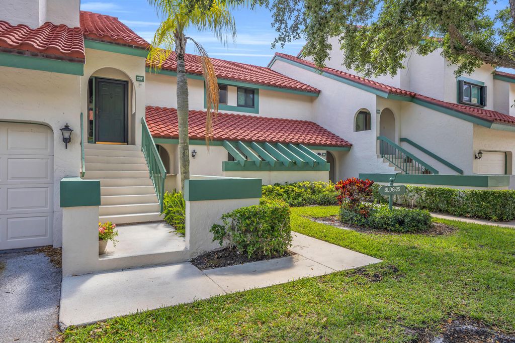 Photo of 25 Lexington Lane W #F, Palm Beach Gardens, FL 33418 (MLS # B26024859)