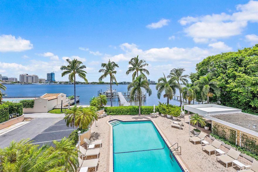 Come home to stunning water views and breathtaking sunsets this Season at the elegant, 24 hr doorman Lake Tower condominium. You won't find rental unit like this one with its 60 ft west facing balcony overlooking pool and intracoastal plus 3 bedrooms/2.5 baths and a coveted covered parking space. Nicely furnished, TVs in all rooms, very private end unit. Located directly on the Lake Trail offering miles of walking, biking, running pleasure, close to beach, short distance to all shopping and dining.and houses of worship. Book this one today!