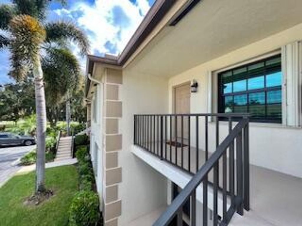 Photo of 102 Pinecrest Circle #C, Jupiter, FL 33458 (MLS # R11125860)
