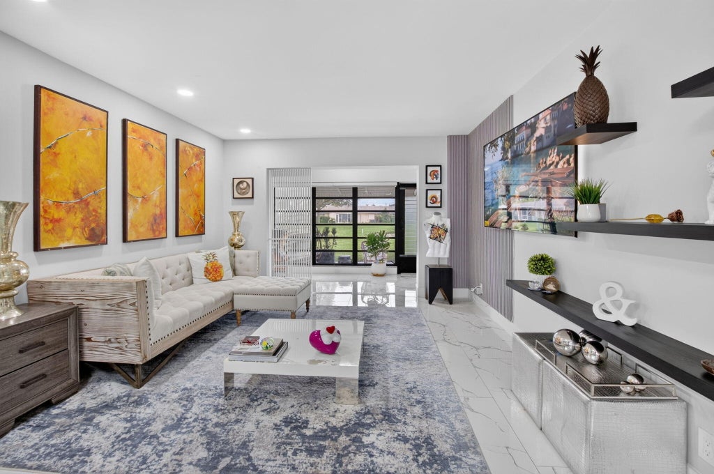 Photo of 8967 Belle Aire Drive, Boca Raton, FL 33433 (MLS # B26059596)