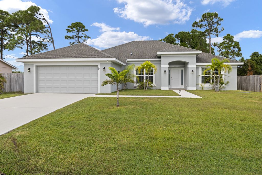 Photo of 137 SW Pisces Terrace, Port Saint Lucie, FL 34984 (MLS # R11139548)