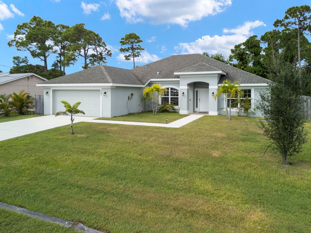 Photo of 137 SW Pisces Terrace, Port Saint Lucie, FL 34984 (MLS # R11139548)