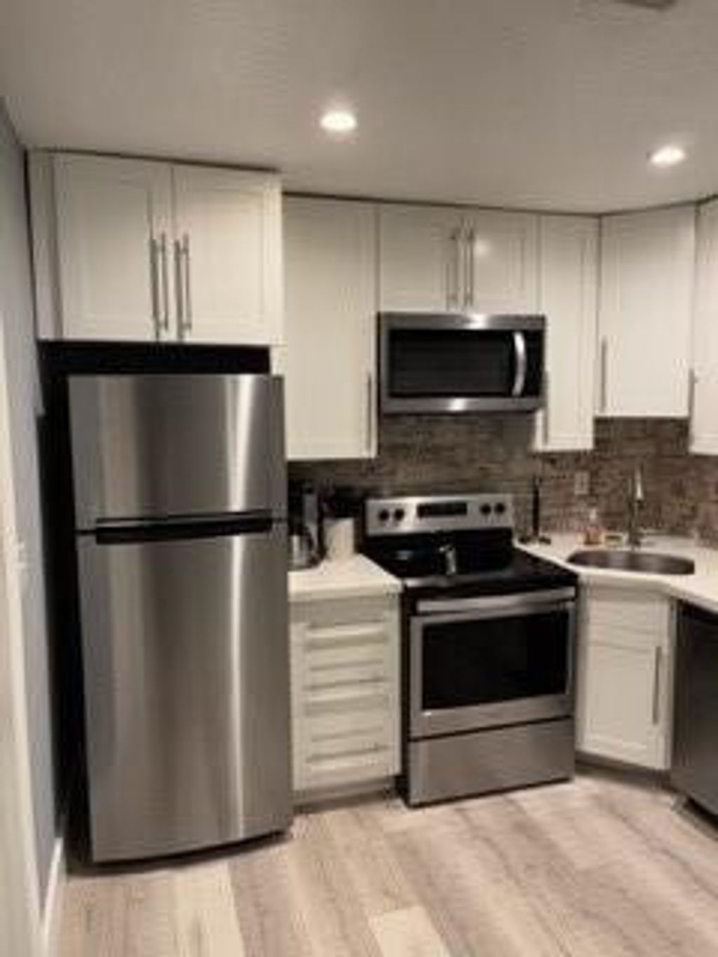 Photo of 565 NE 34th Court #B, Oakland Park, FL 33334 (MLS # B26018655)