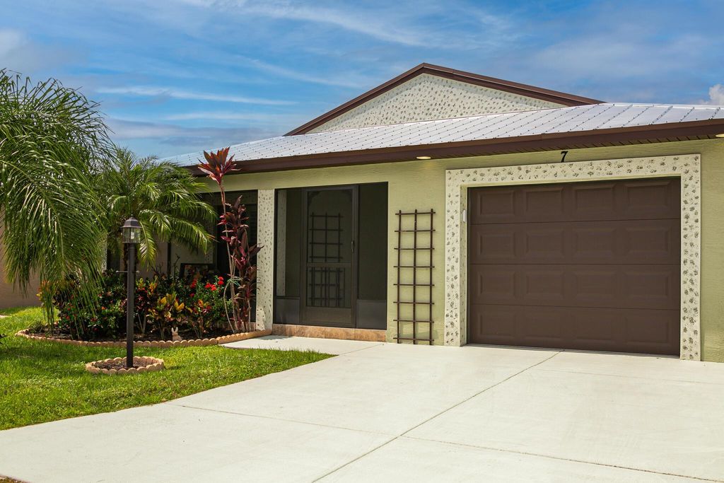 Photo of 7 Barcelona Lane, Port Saint Lucie, FL 34952 (MLS # R10915350)