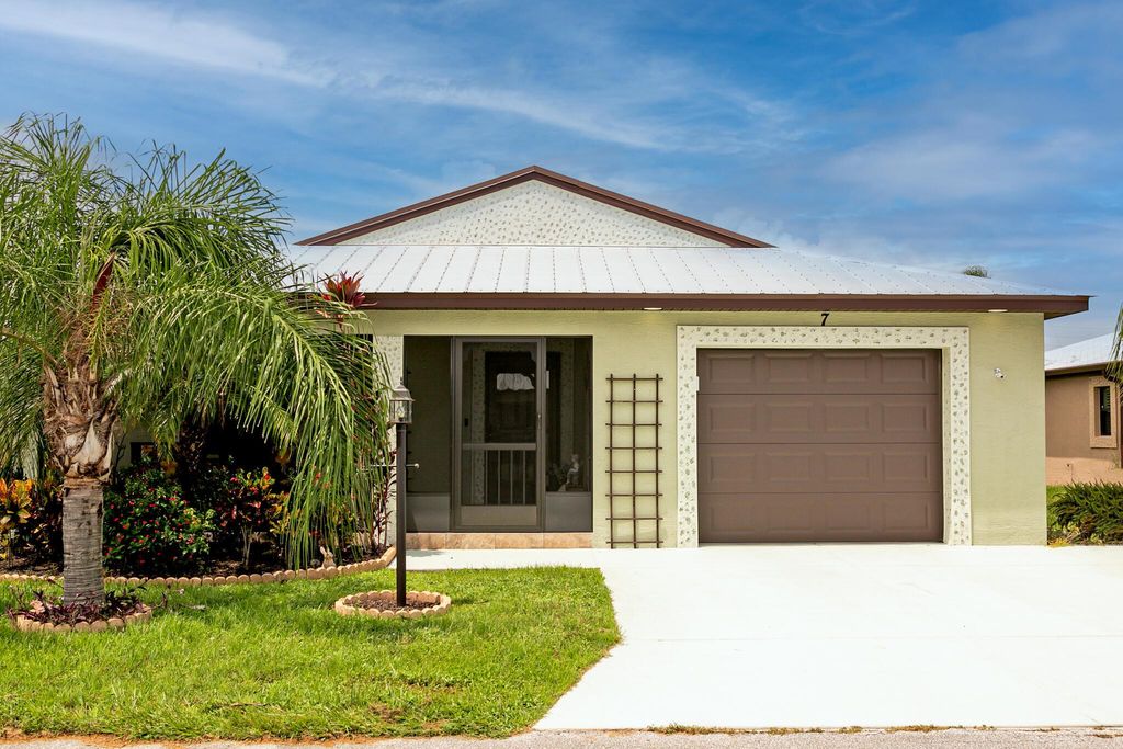 Photo of 7 Barcelona Lane, Port Saint Lucie, FL 34952 (MLS # R10915350)
