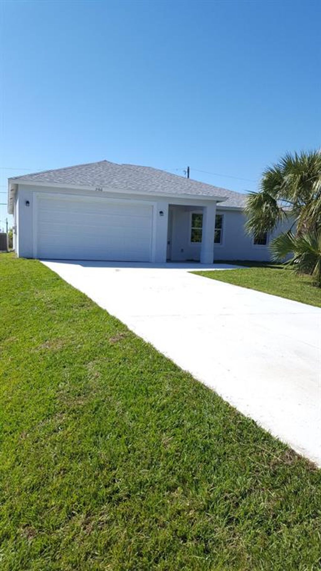 Photo of 3466 SW Darwin Boulevard, Port Saint Lucie, FL 34953 (MLS # R10597866)