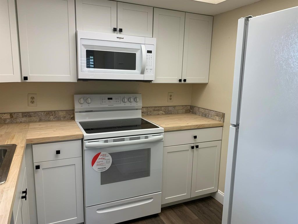 Photo of 1542 SE Royal Green Circle #104, Port Saint Lucie, FL 34952 (MLS # R11121067)