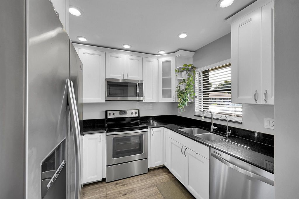 Photo of 16 Via De Casas Norte #16, Boynton Beach, FL 33426 (MLS # R11137679)