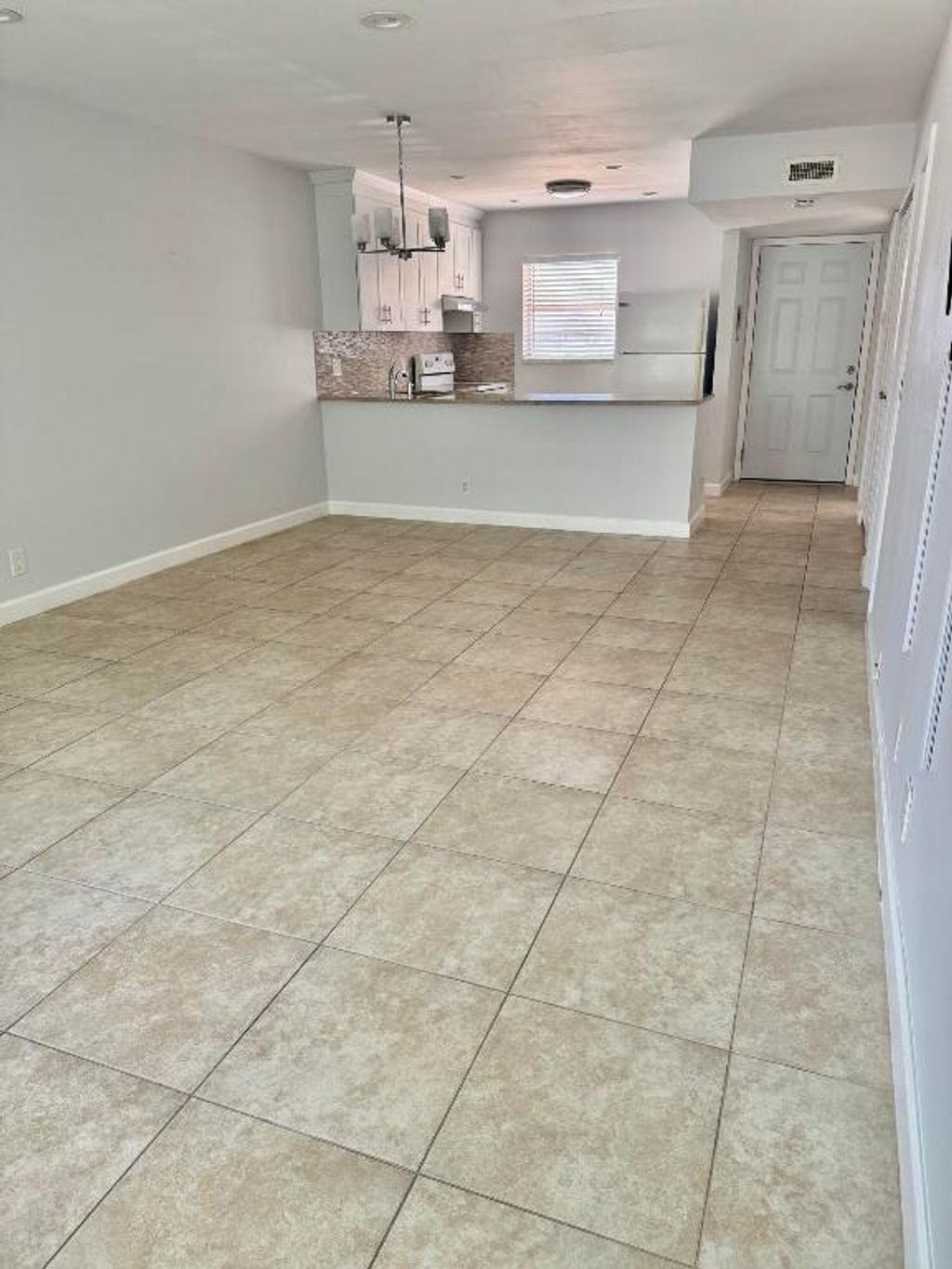 Photo of 12007 Poinciana Boulevard #2060, Royal Palm Beach, FL 33411 (MLS # R11121573)