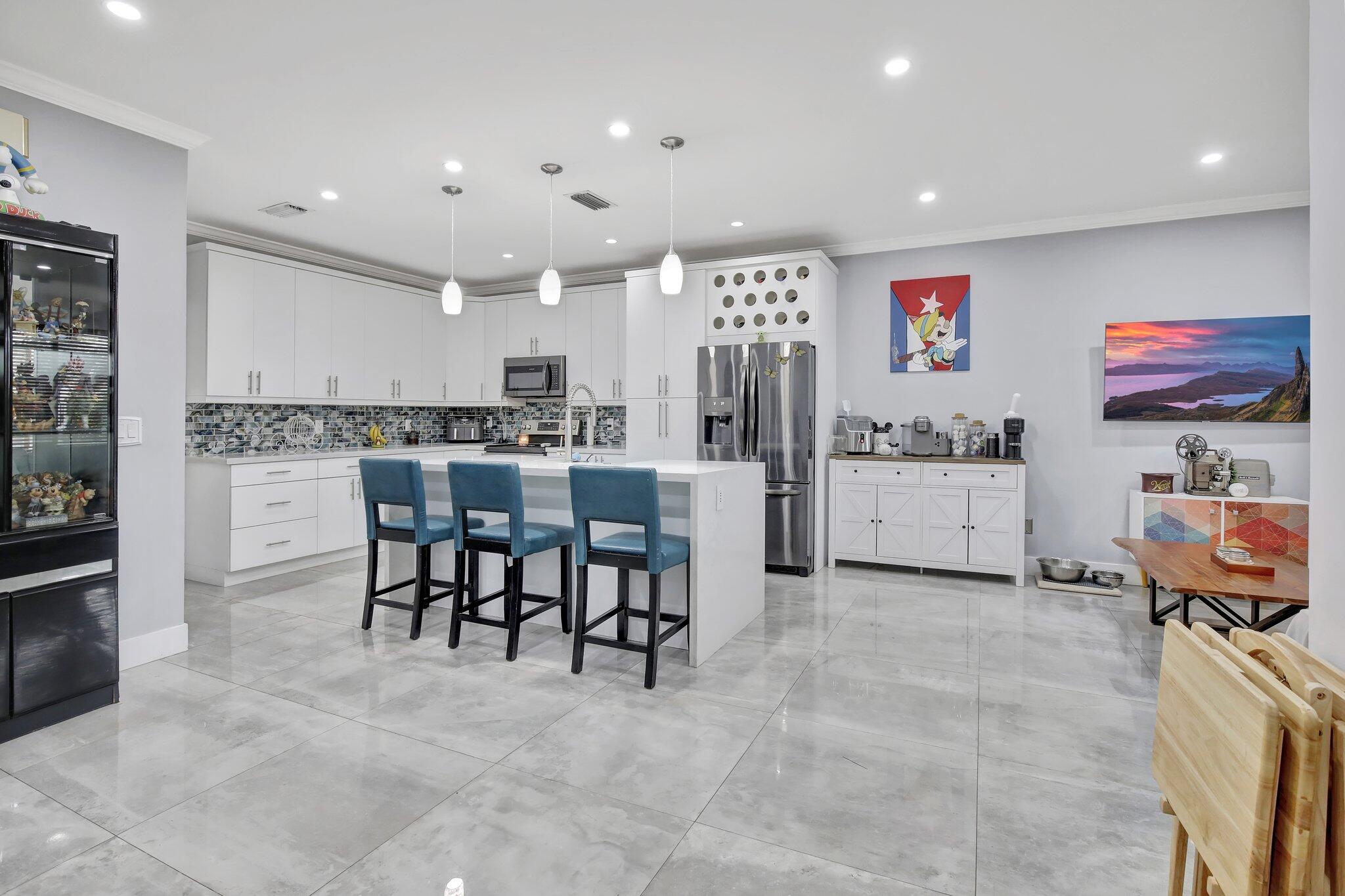 PRICED TO SELL!!! Amazing location! Highly sought-after Towngate Community. Right in the heart of Pembroke Pines. Conveniently located near I-75 and Pines Blvd. COMPLETELY UPGRADED HOME! HURRICANE IMPACT WINDOWS! Low HOA! Beautiful open kitchen with a huge island! Gorgeous quartz countertops. New cabinets and backsplash. Plenty of room for entertaining. Large 3 foot tile flooring on first level. Tile throughout home. Beautifully upgraded bathrooms. A/C installed 2018. Excellent schools. New pavers in backyard for easy maintenance. Multiple fruit trees in the backyard. Smart mirror outlet in half bath. Tons of association amenities including swimming pools, ball fields, fitness center, basketball court, playground, etc. DO NOT MISS OUT! MOTIVATED SELLER