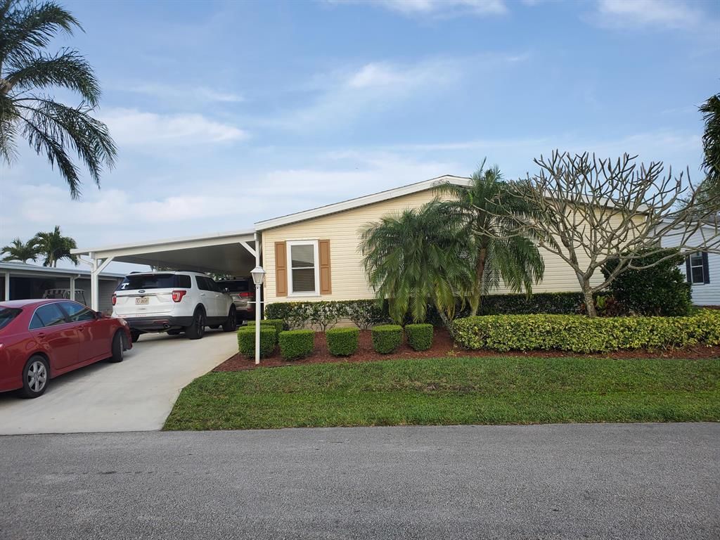 Photo of 8008 9th Hole Drive, Port Saint Lucie, FL 34952 (MLS # R10703975)