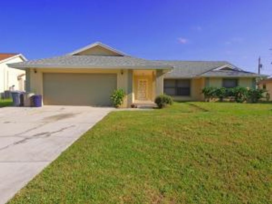 Lovely and clean solid cement home with tile flooring through out.  Big back yard that is fenced.  Screened covered back patio for enjoying that morning coffee on a quiet street in a good very neighborhood.  Please come take a look at this move in ready 3/2/2.