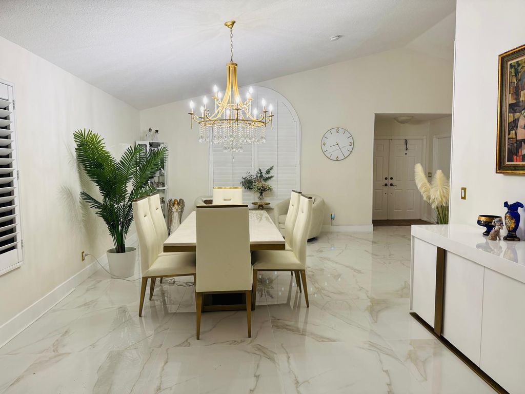 Photo of 544 NW 38 Avenue, Deerfield Beach, FL 33442 (MLS # R11168725)