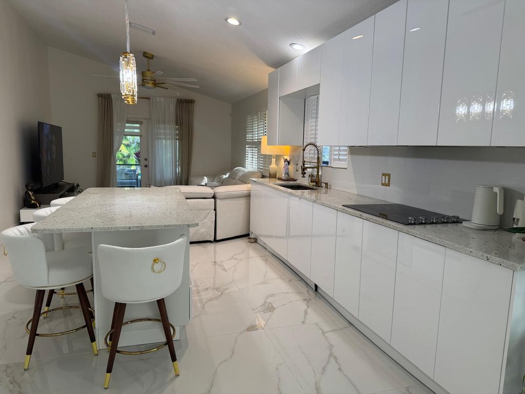 Photo of 544 NW 38 Avenue, Deerfield Beach, FL 33442 (MLS # R11168725)