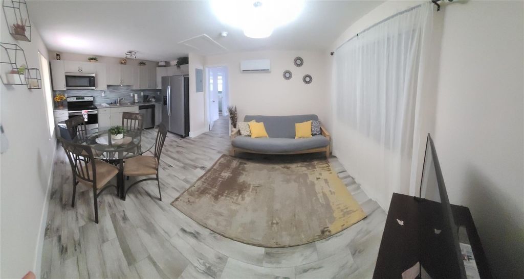 Photo of 49 E 27th Street, Riviera Beach, FL 33404 (MLS # F10542611)