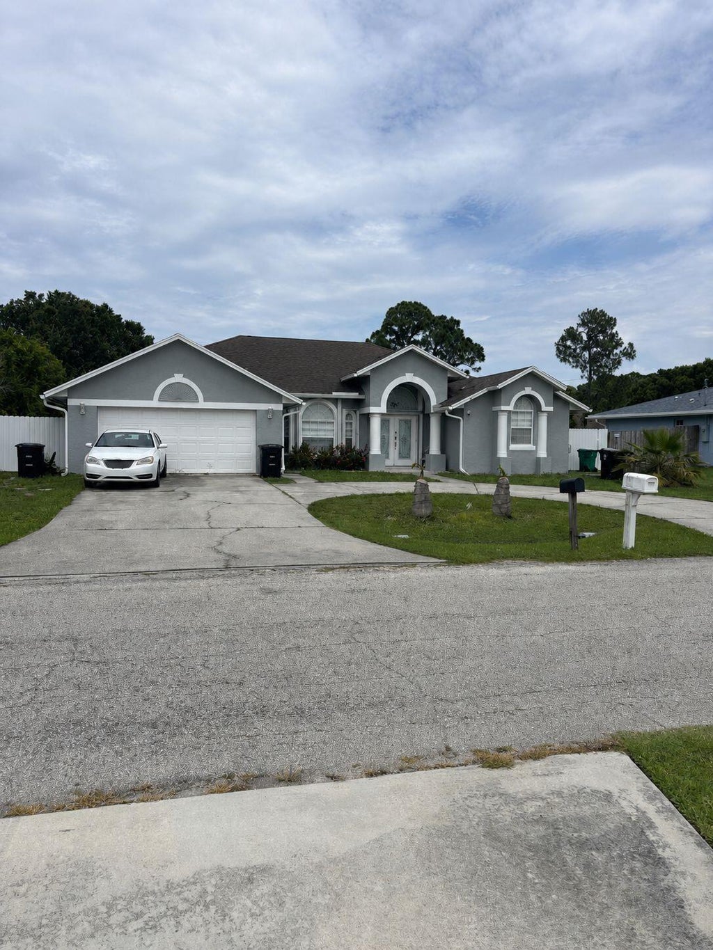Photo of 219 NW Biltmore Street, Port Saint Lucie, FL 34983 (MLS # B26036745)