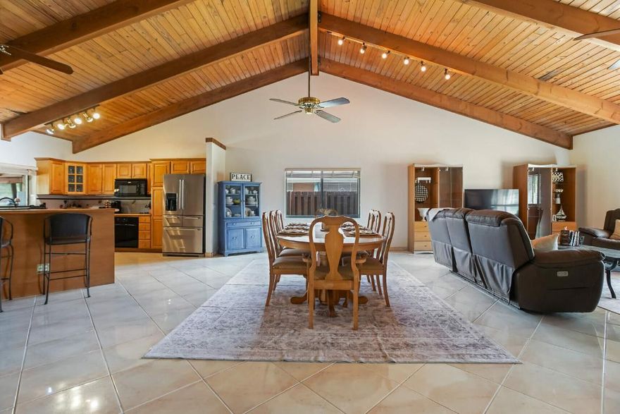 BUY WITH NO MONEY DOWN!!! This amazing 4 bed 2 bath waterfront home with no HOA has an open floor plan with high vaulted wood ceilings and abundant natural light. Boat Parking - dedicated concrete pad for your boat on the side of your home. Solar-Powered system covers 100% of electricity. Saltwater Pool is a low-maintenance, luxurious swimming experience with a full-size basketball goal. Covered back patio with a tropical fish tank and plenty of seating for all of your entertaining needs. 4th bedroom is a converted garage with extra space for an office or game room. Can easily be reverted back to a garage. Prime Location, only three houses down from a beautiful local park kids will love! Just minutes away from 95 and the Turnpike.