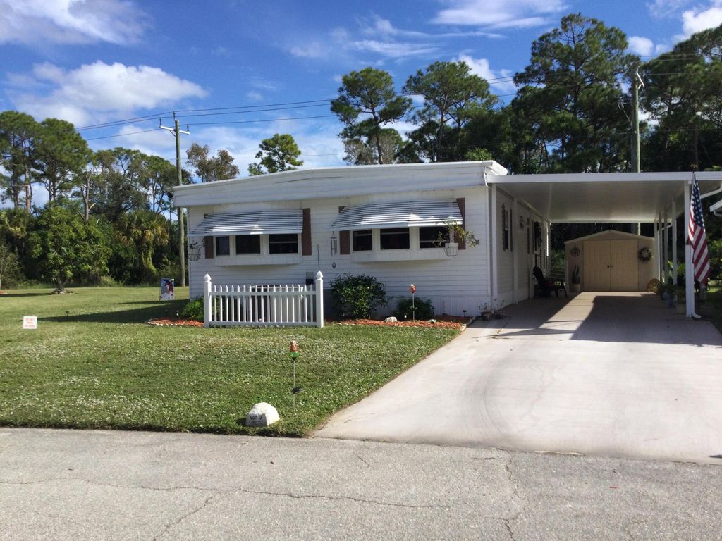 Photo of 26 Mediterranean Boulevard E, Port Saint Lucie, FL 34952 (MLS # R11147543)