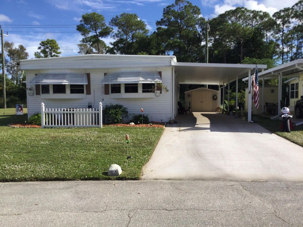 Photo of 26 Mediterranean Boulevard E, Port Saint Lucie, FL 34952 (MLS # R11147543)