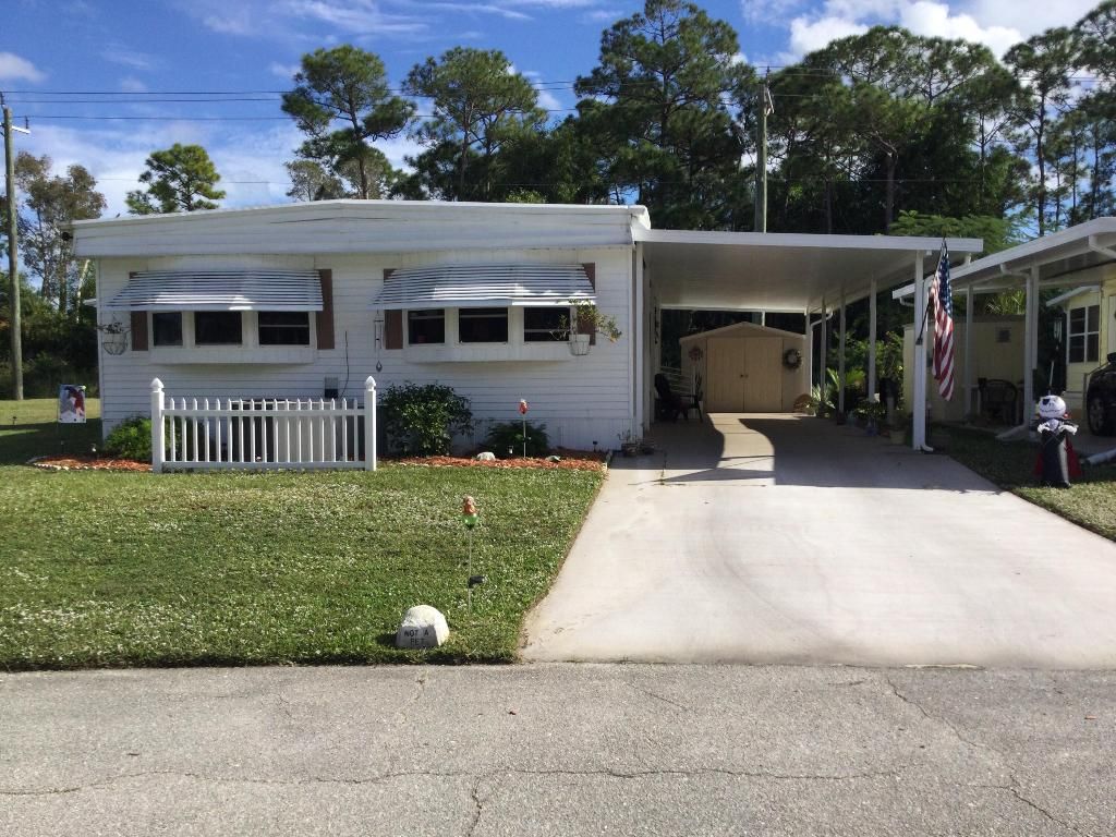 Photo of 26 Mediterranean Boulevard E, Port Saint Lucie, FL 34952 (MLS # R11147543)