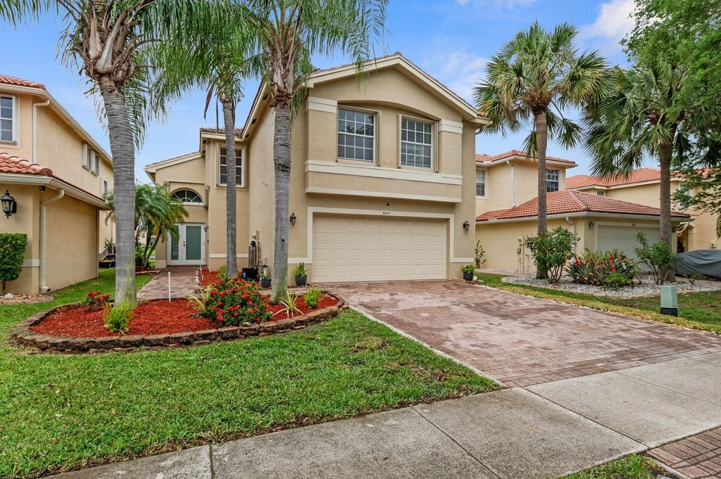 Photo of 5217 Rising Comet Lane, Greenacres, FL 33463 (MLS # B26017210)