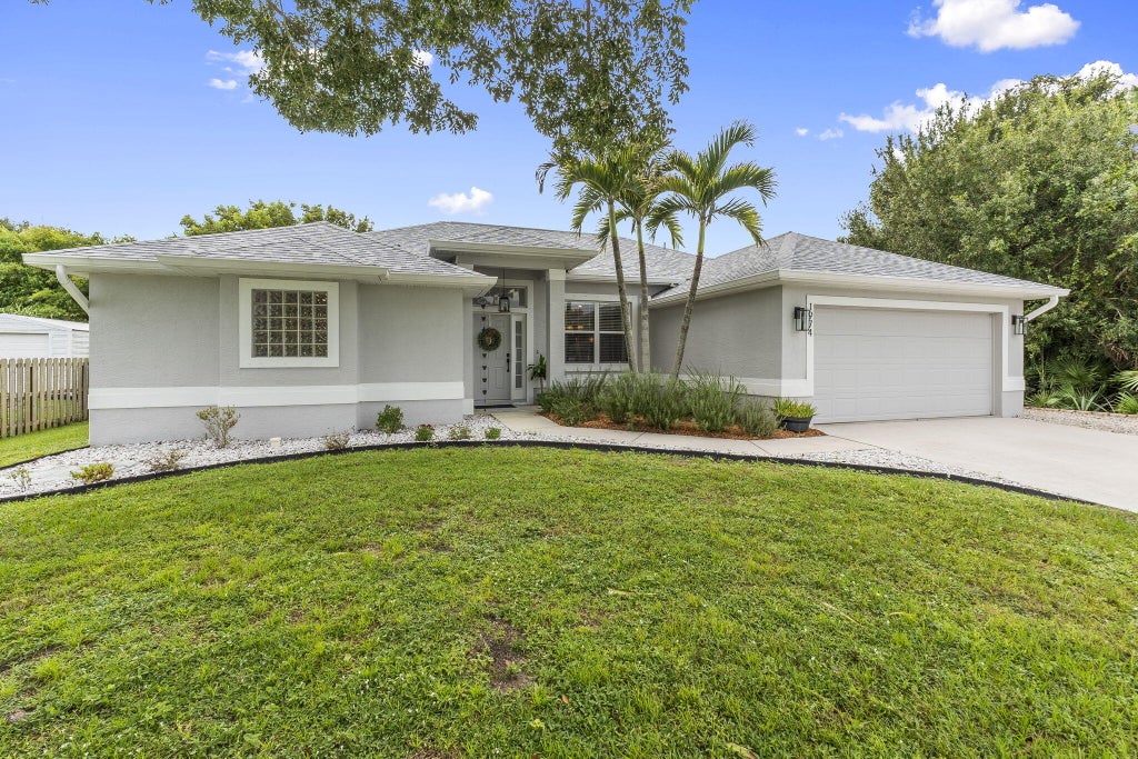 Photo of 1974 SW BEAUREGARD Street, Port Saint Lucie, FL 34953 (MLS # B26078164)