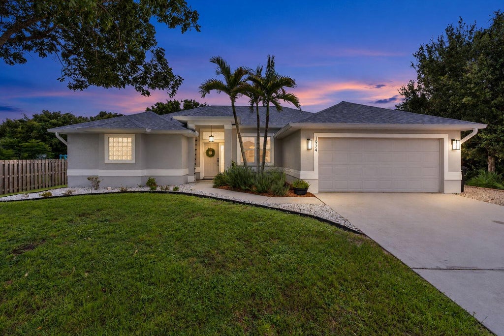Photo of 1974 SW BEAUREGARD Street, Port Saint Lucie, FL 34953 (MLS # B26078164)