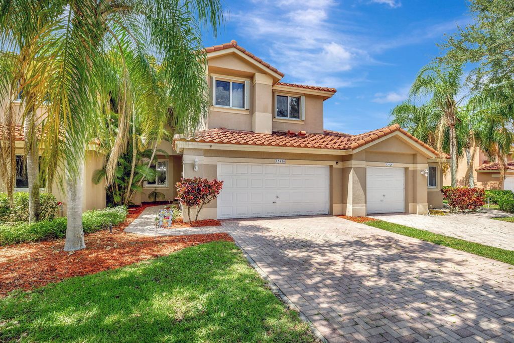 Photo of 12618 NW 56th Drive, Coral Springs, FL 33076 (MLS # R11089682)