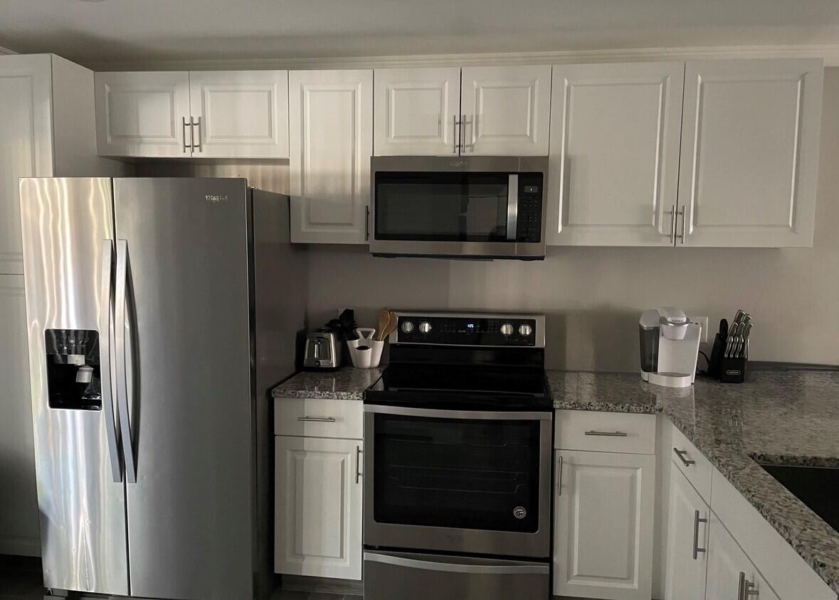 SHEFFIELD WOODS AT WELLINGTON CONDO - Residential Lease