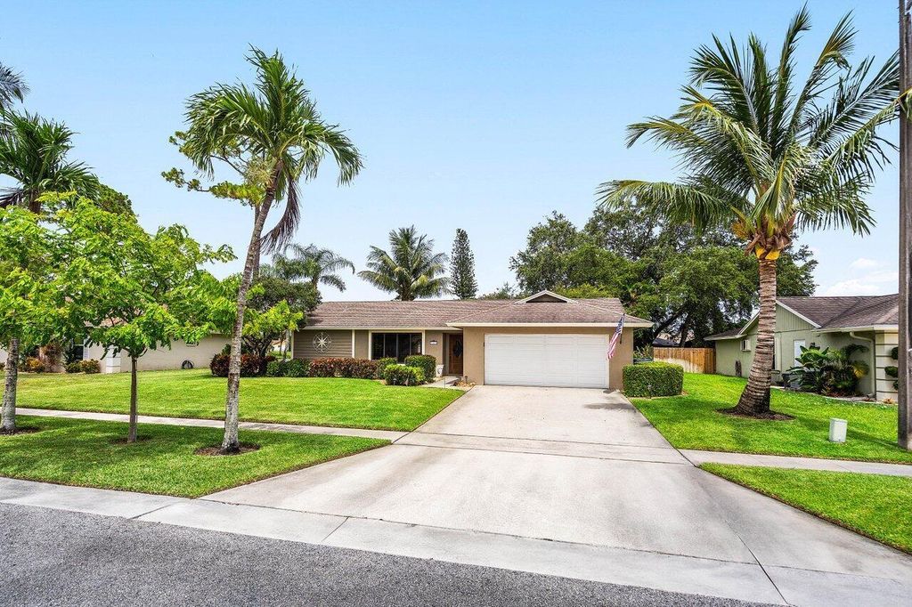 Photo of 129 Parkwood Drive, Royal Palm Beach, FL 33411 (MLS # R11097320)