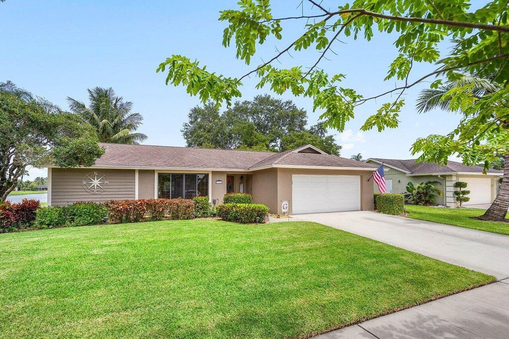 Photo of 129 Parkwood Drive, Royal Palm Beach, FL 33411 (MLS # R11097320)