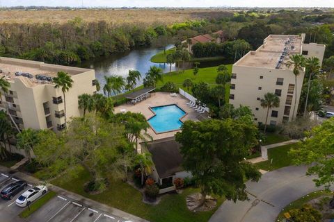 Photo of 3100 NW 42nd Avenue #D404, Coconut Creek, FL 33066 (MLS # R11156823)