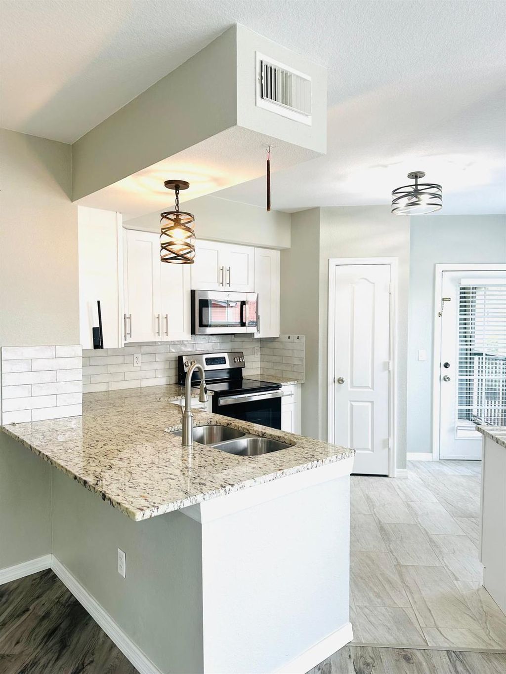 Photo of 102 SW Peacock Boulevard #2-104, Port Saint Lucie, FL 34986 (MLS # R10990412)